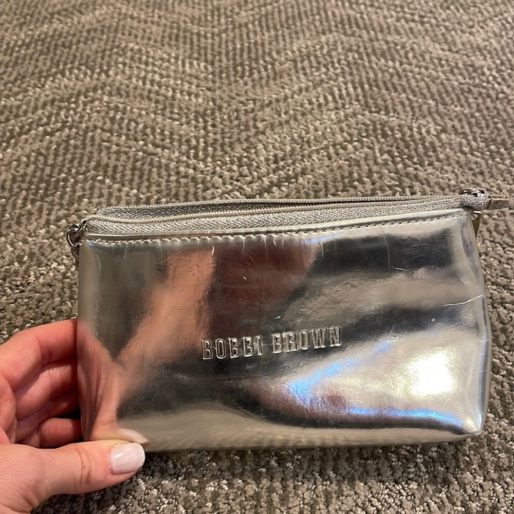 Bobbi Brown Metallic Silver small clutch for makeup or sunglasses
